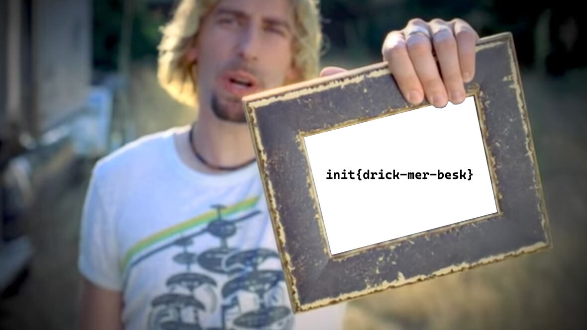 Nickel back holding a picture frame with the WiFi password written on it.
